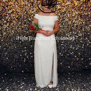 Beautiful dress. White off the shoulder.